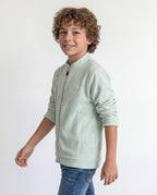 Boys' jacket with a full zip front and stand collar.