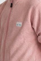 Boys' jacket with a full zip front and stand collar.